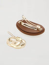 set of 2 metal and leather hair clips