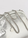 laminated faux leather clutch
