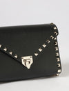 rockstud grained leather clutch