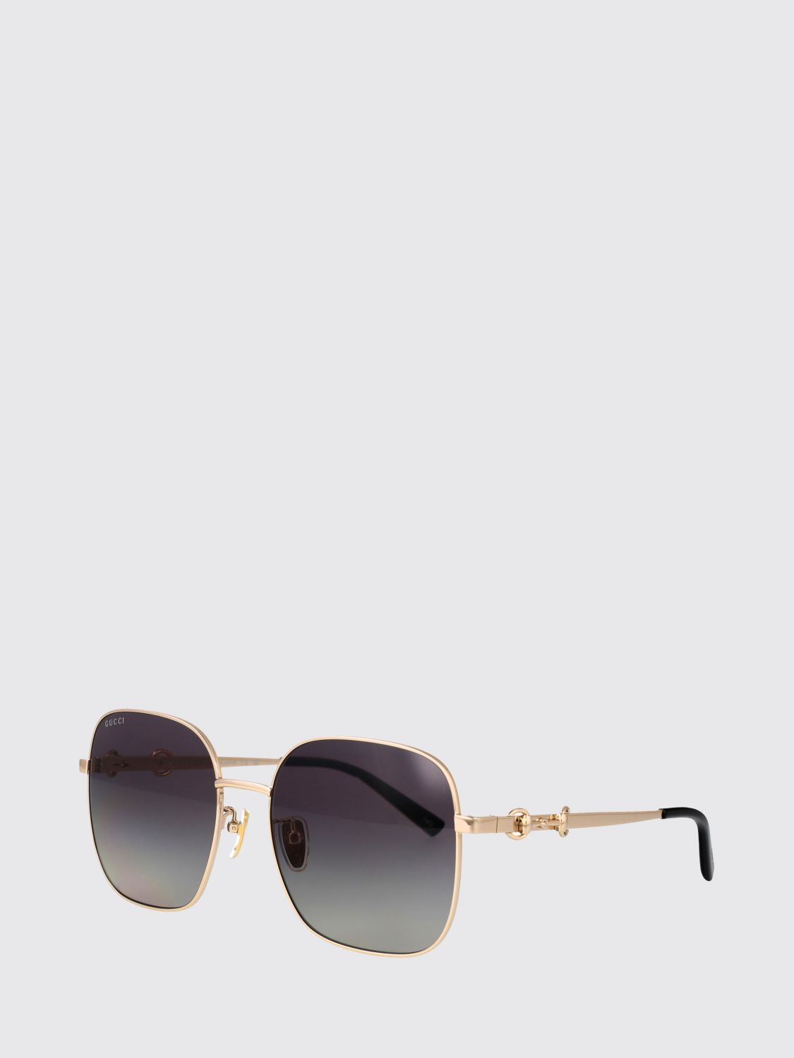 cat-eye metal sunglasses with horsebit detail on the temples
