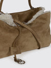 suede and shearling rodeo bag with logo bow