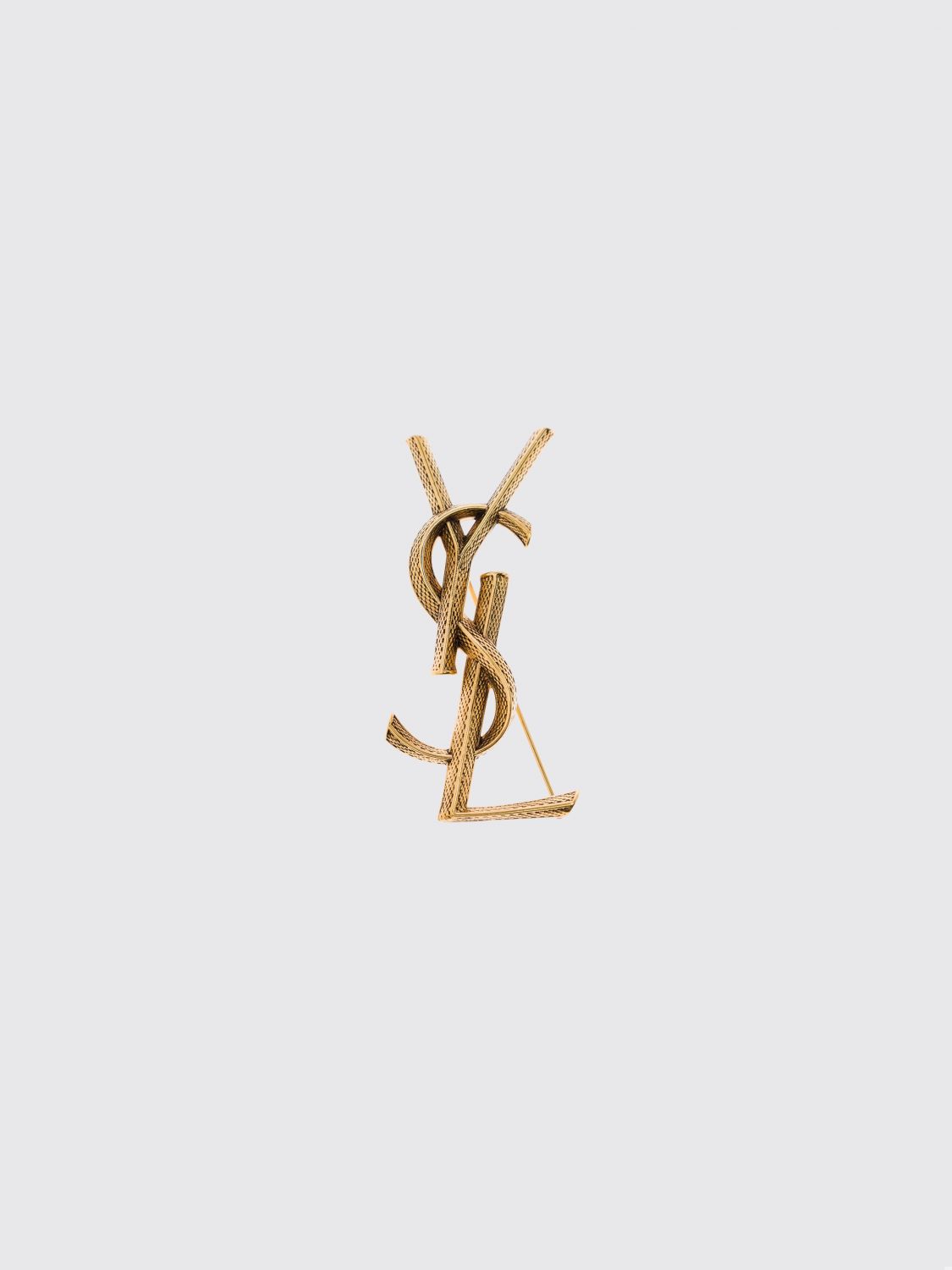 cassandre ysl monogram brooch in brass