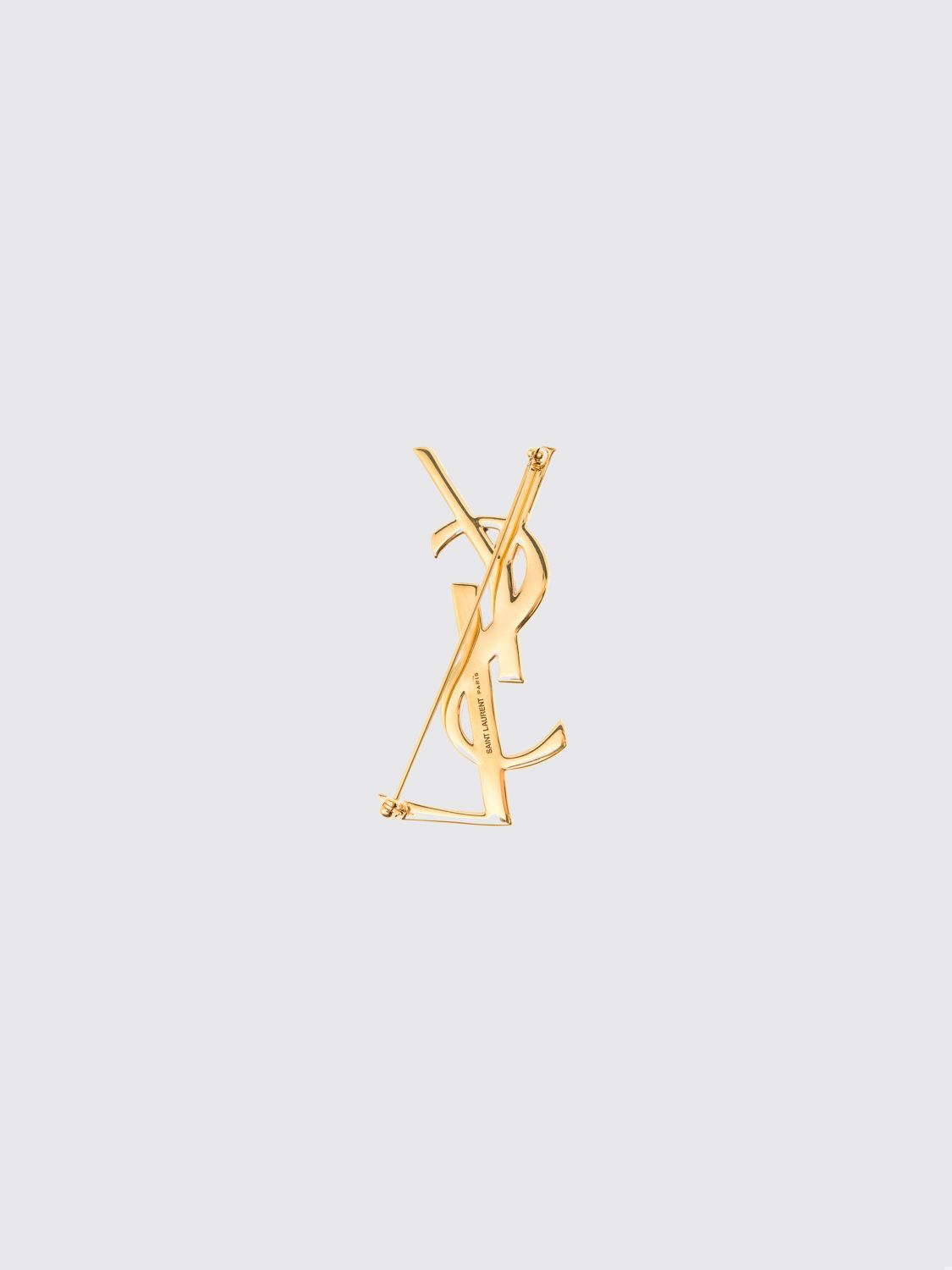 cassandre ysl monogram brooch in brass