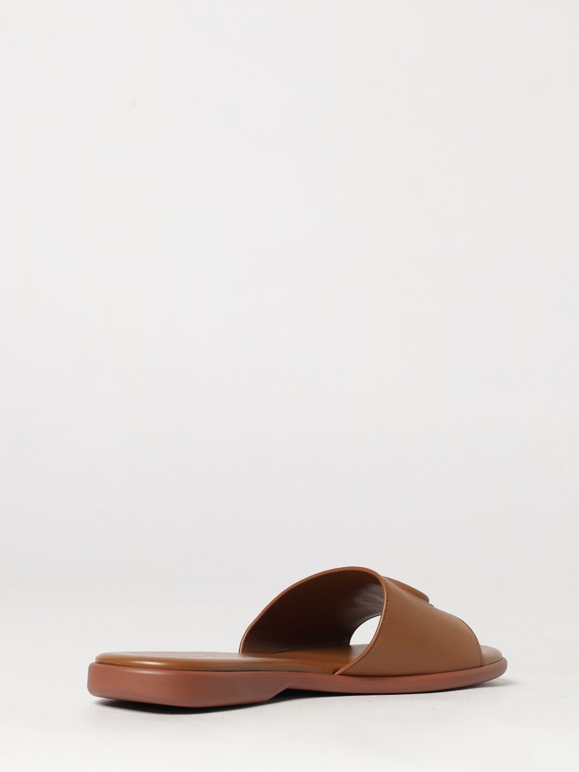 calfskin leather slides with embossed gg monogram