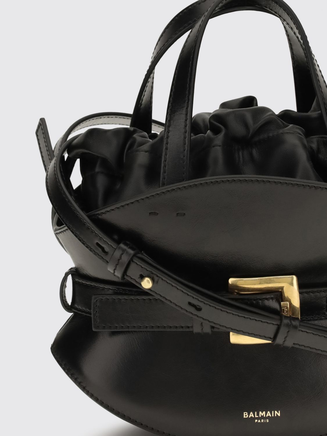 shuffle leather hourglass handbag with drawstring closure
