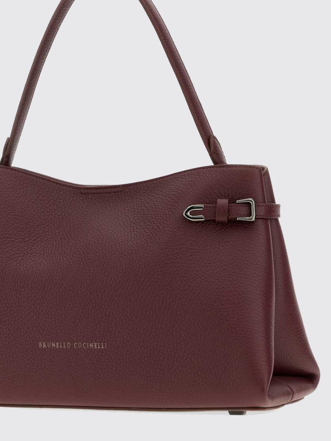 leather shoulder bag with flat handle and magnetic closure