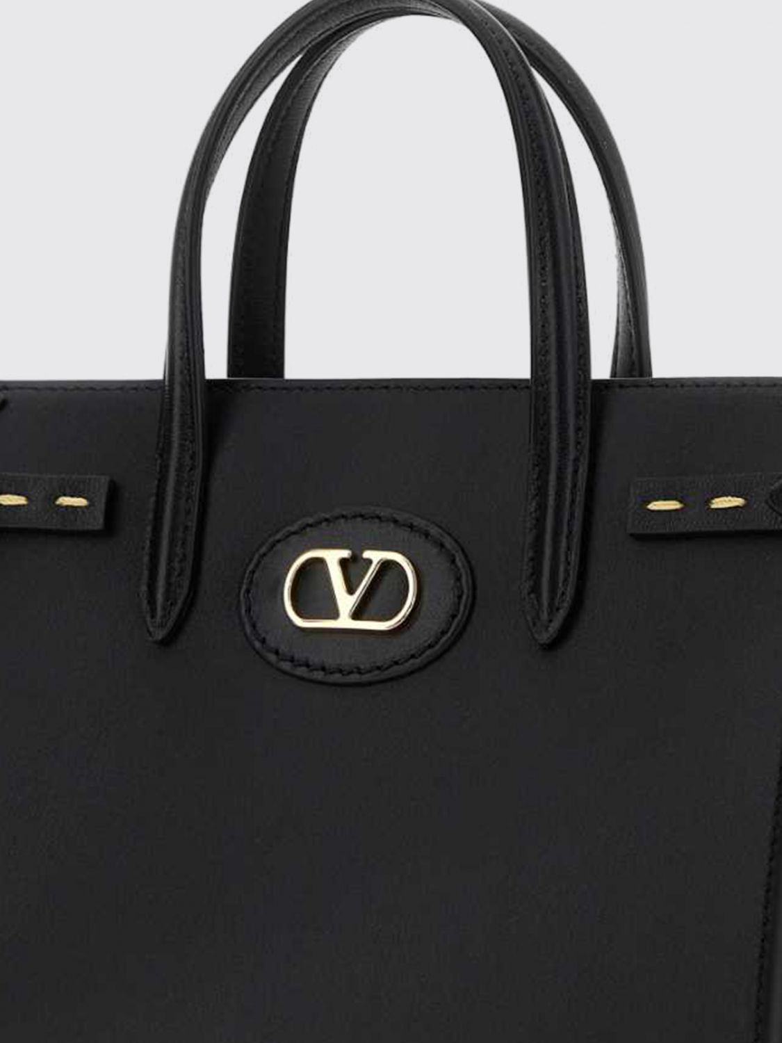 antibes mini leather handbag with vlogo signature