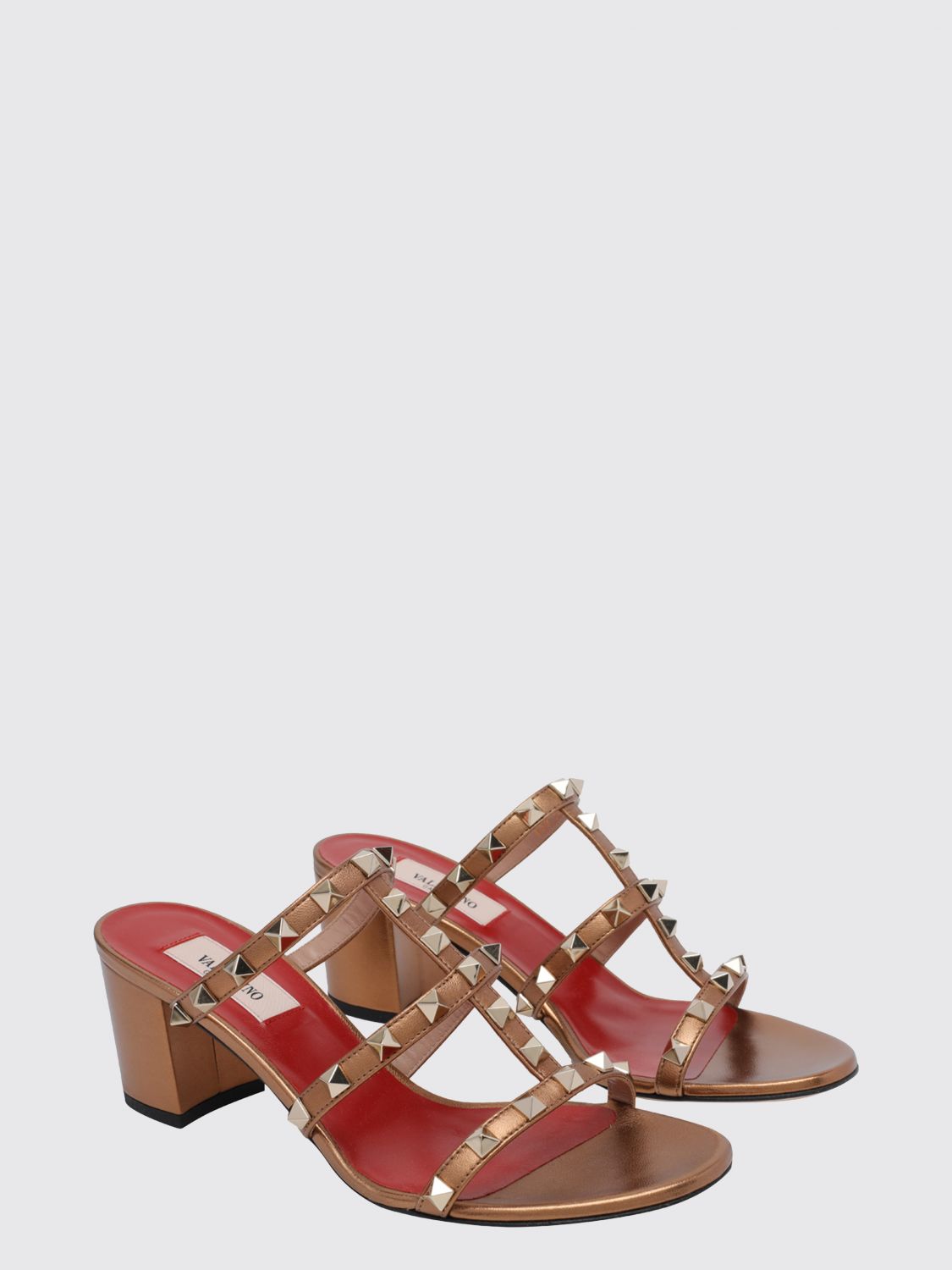 rockstud mule sandals in laminated leather with studs