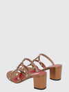 rockstud mule sandals in laminated leather with studs