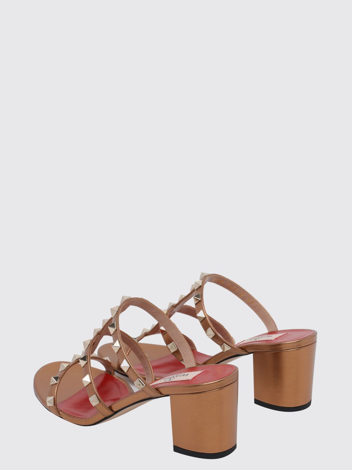 rockstud mule sandals in laminated leather with studs
