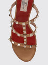 rockstud mule sandals in laminated leather with studs