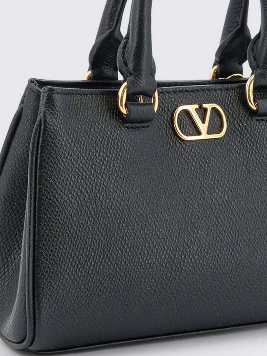 grained leather handbag with vlogo signature