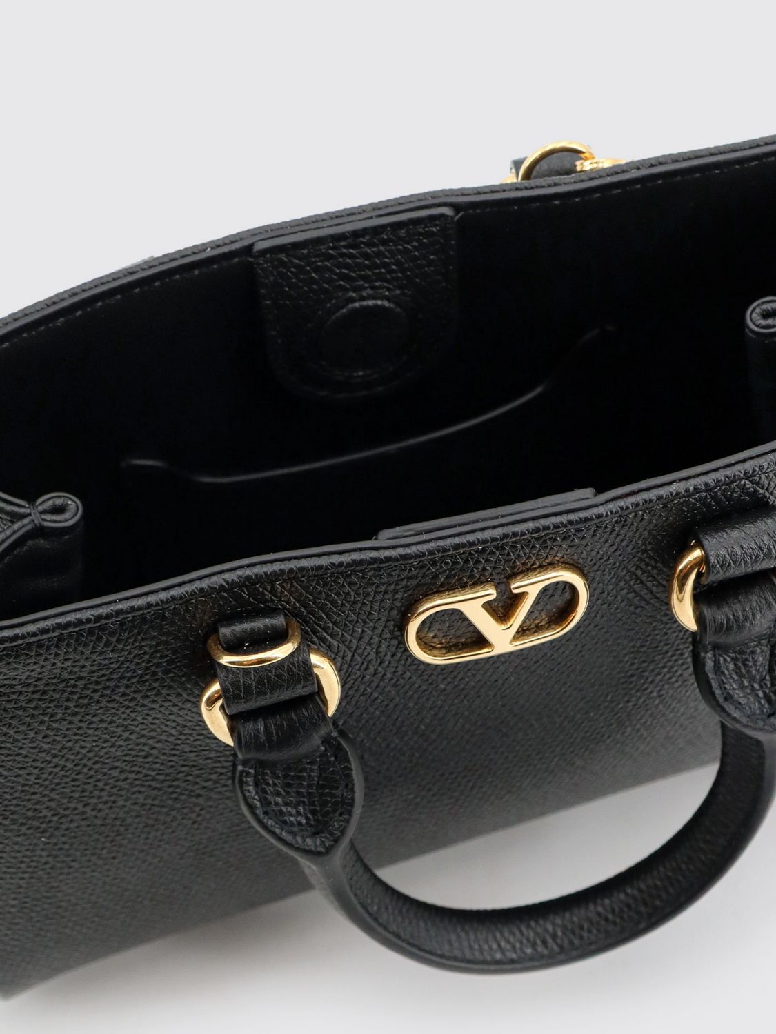 grained leather handbag with vlogo signature