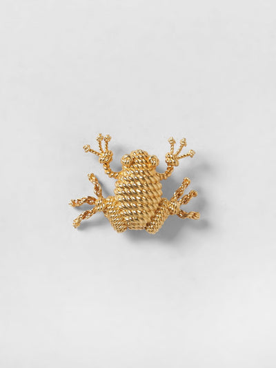 rana gold-coloured brass brooch with engraved logo