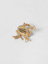 rana gold-coloured brass brooch with engraved logo