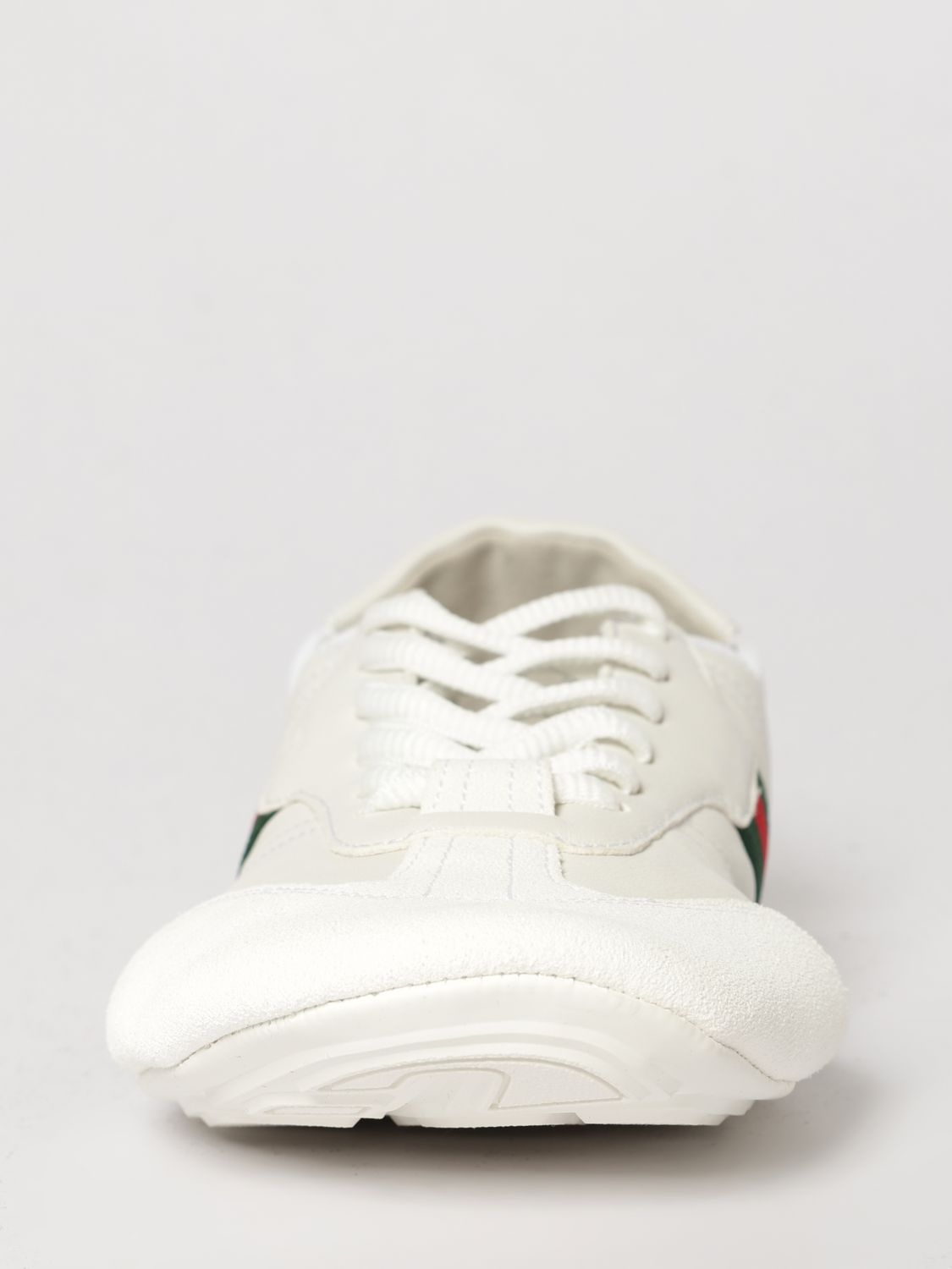 flex low-top leather sneakers with iconic web detail