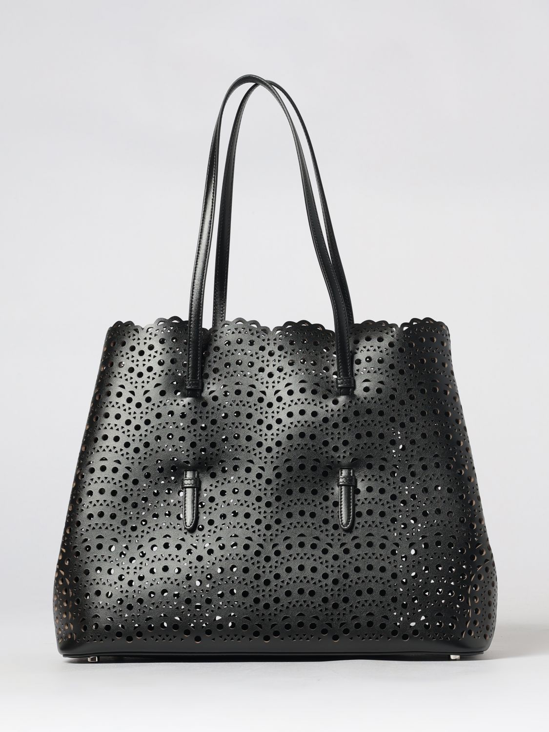 mina shoulder bag in smooth calfskin leather with perforated design and pouch