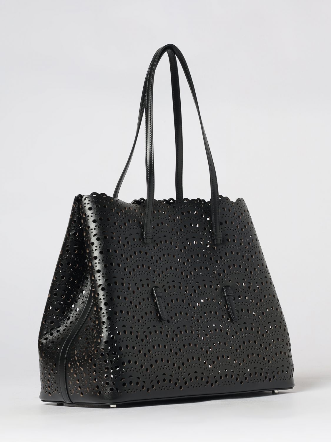 mina shoulder bag in smooth calfskin leather with perforated design and pouch