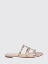rockstud flat sandals in laminated leather with studs