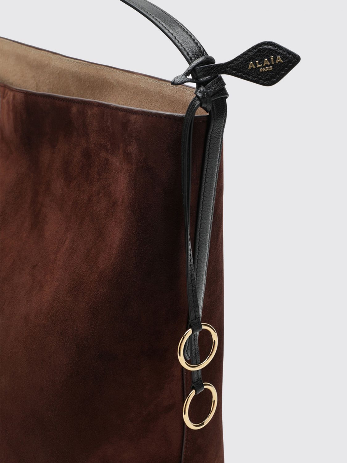 hip suede bucket bag with charm