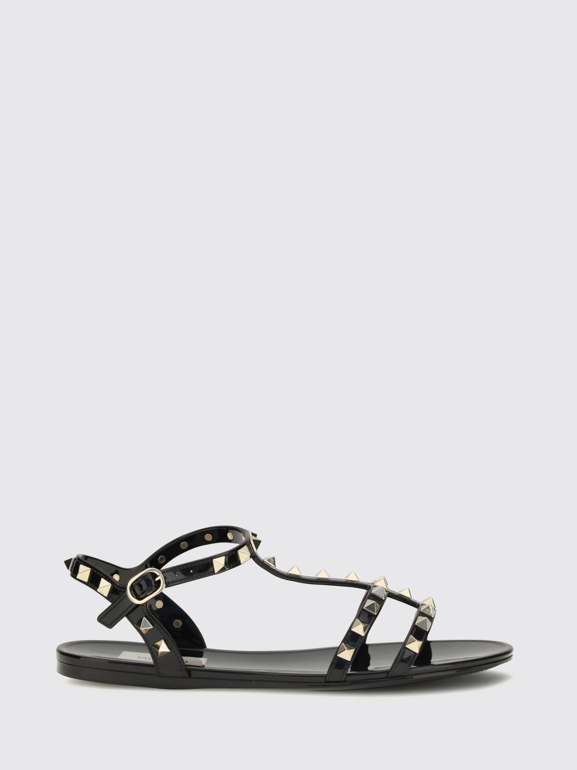 rockstud low-heeled rubber t-strap sandals