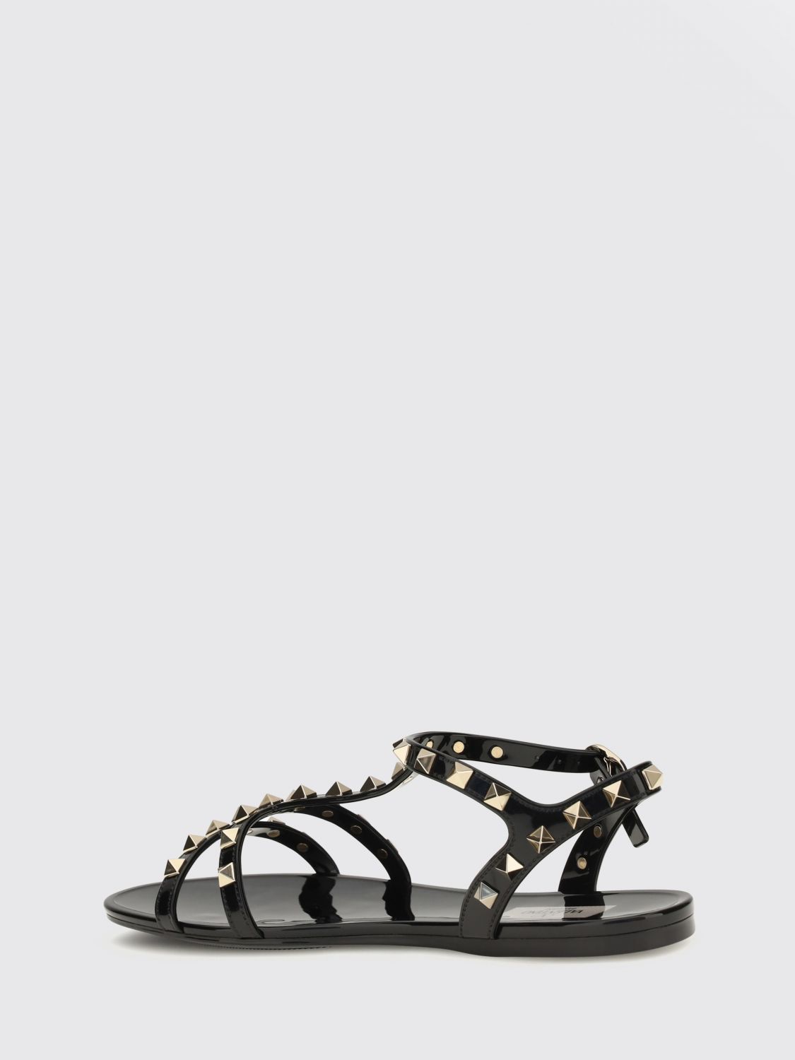 rockstud low-heeled rubber t-strap sandals
