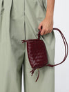 concert mini crossbody bag in intrecciato leather with knots