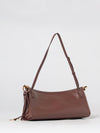 le click east west smooth leather shoulder bag with tassels