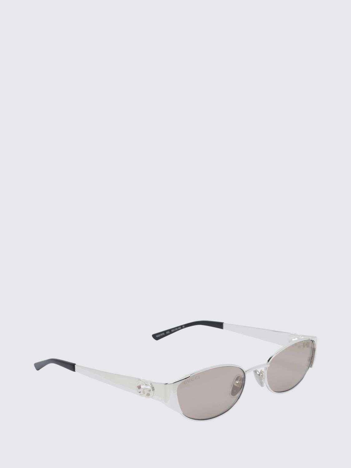 gold-tone metal cat-eye sunglasses with oval shape and gg logo