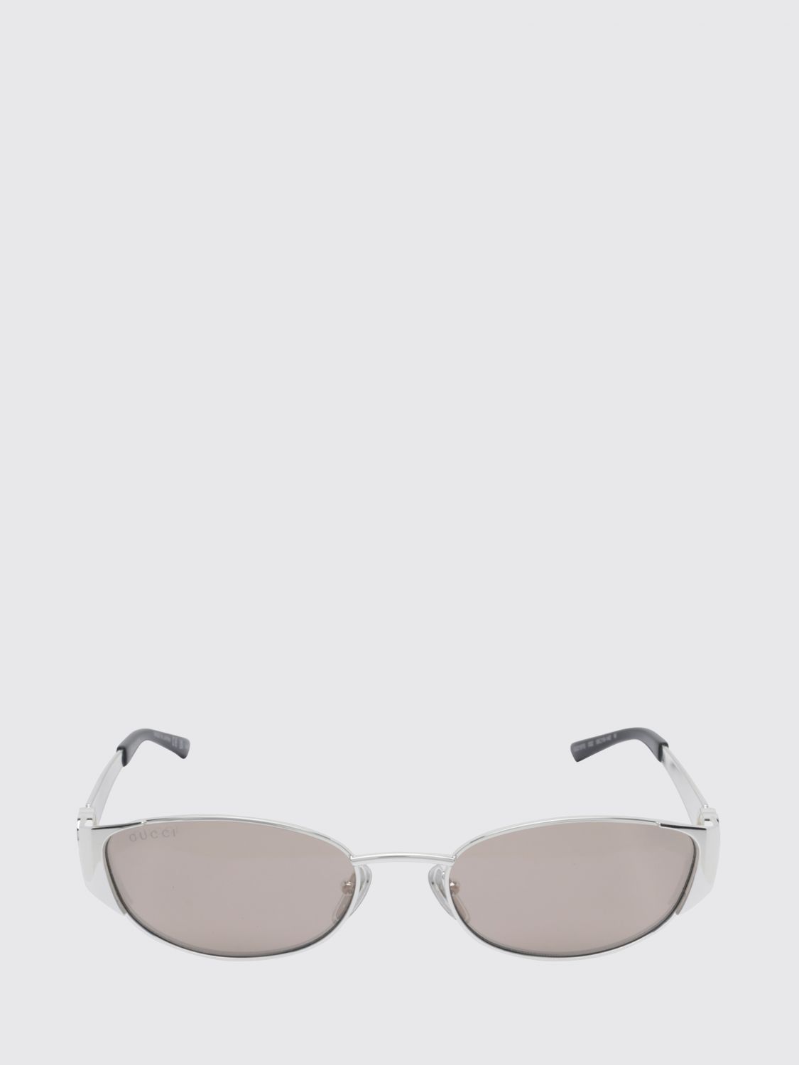 gold-tone metal cat-eye sunglasses with oval shape and gg logo