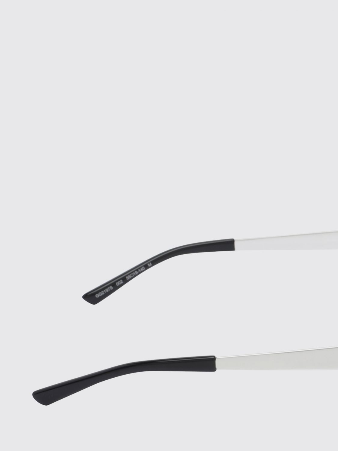 gold-tone metal cat-eye sunglasses with oval shape and gg logo