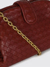 lauren 1980 intrecciato lambskin clutch with strap