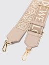 adjustable canvas and leather shoulder strap with jacquard logo