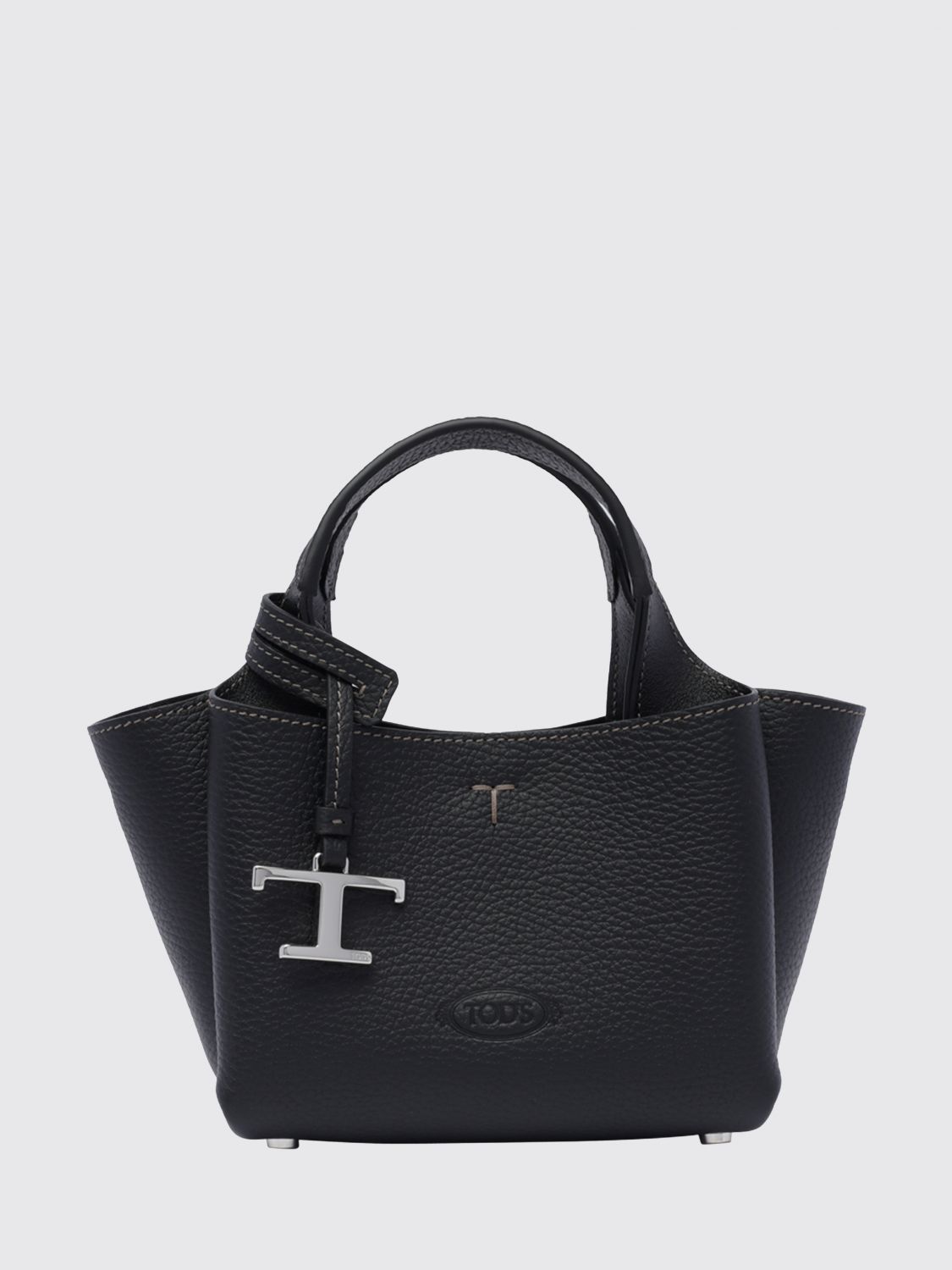 small grained leather handbag with flared design and charm