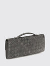 andiamo intrecciato suede leather clutch