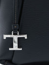 grained leather handbag with zip closure and logo charm