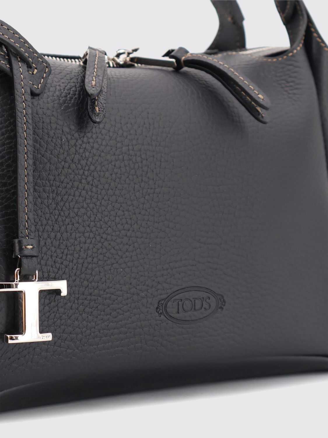 grained leather handbag with shoulder strap and logo charm