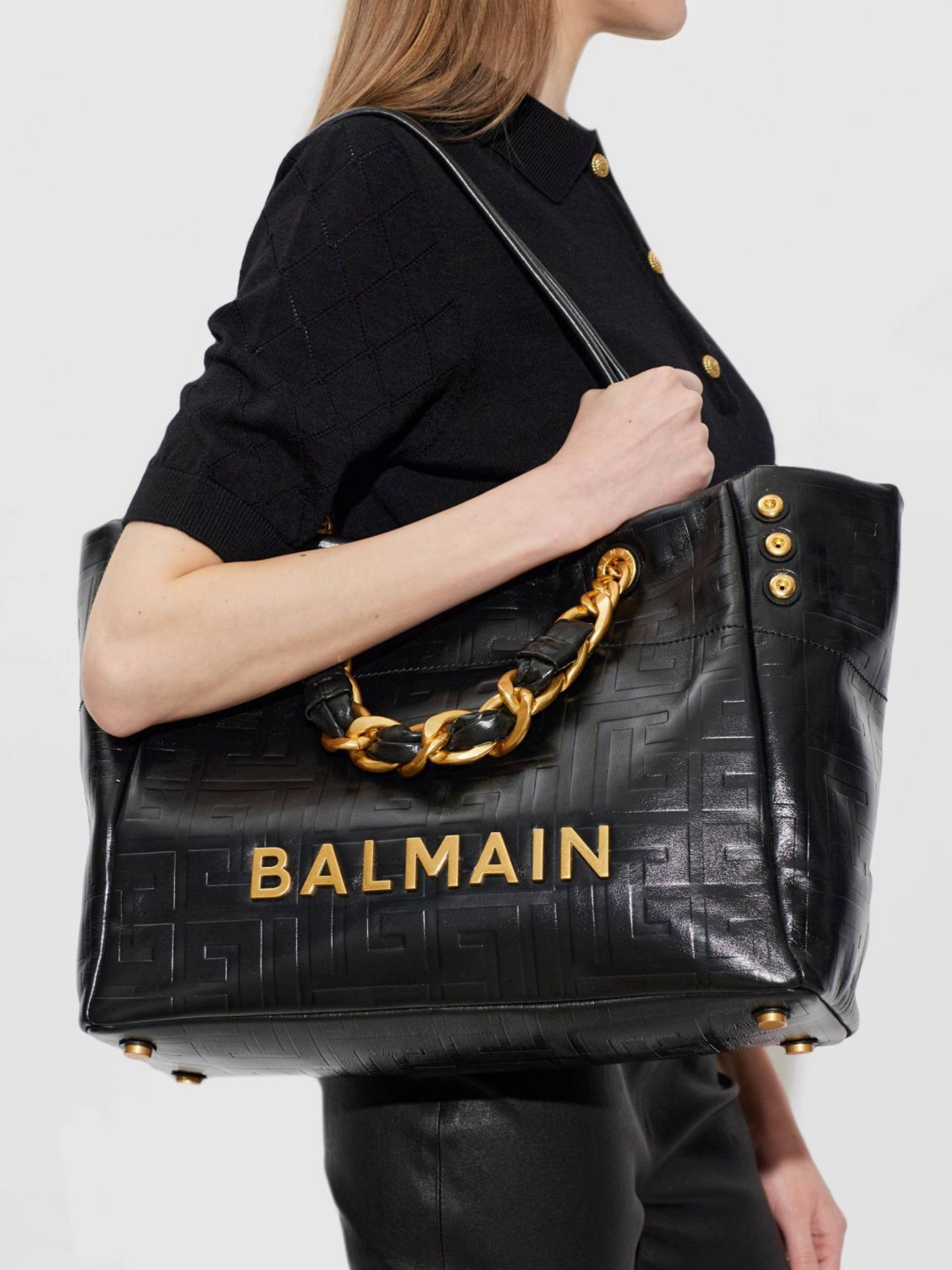 1945 soft calfskin leather shoulder bag with lettering logo and four handles