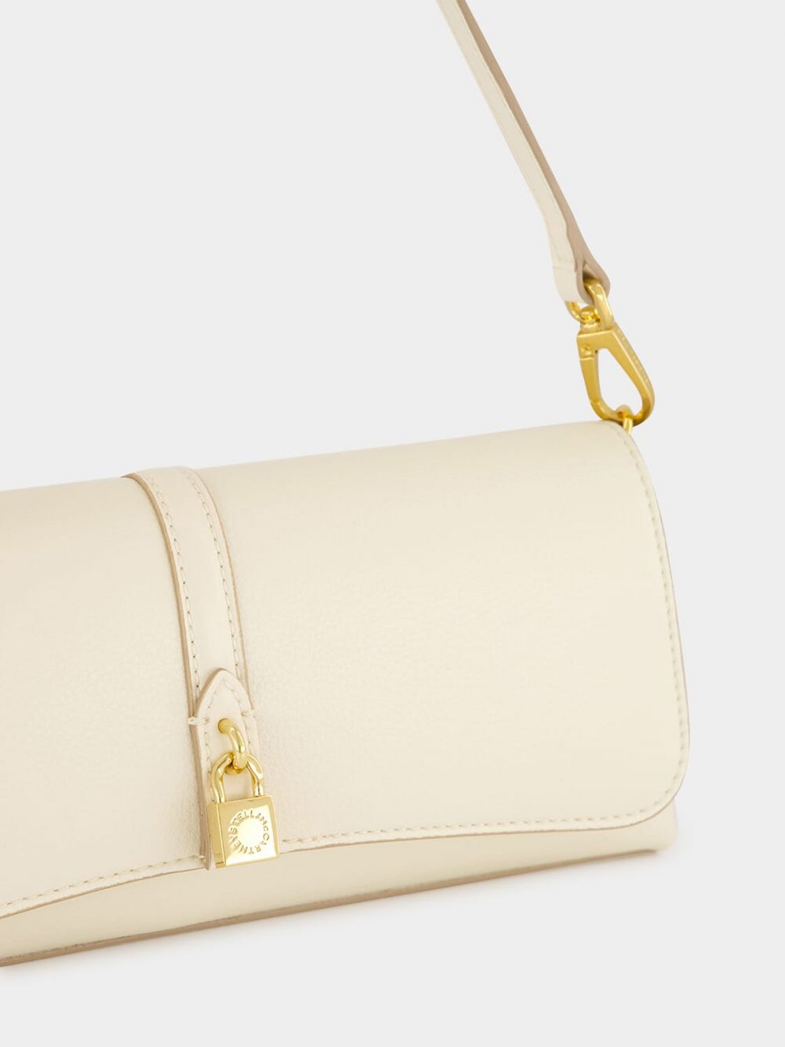 ryder vegan nylon shoulder bag with magnetic flap closure