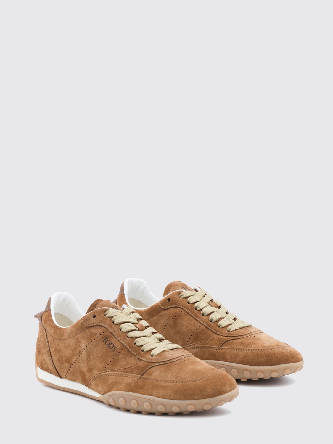 suede low-top sneakers with gommini and embossed logo