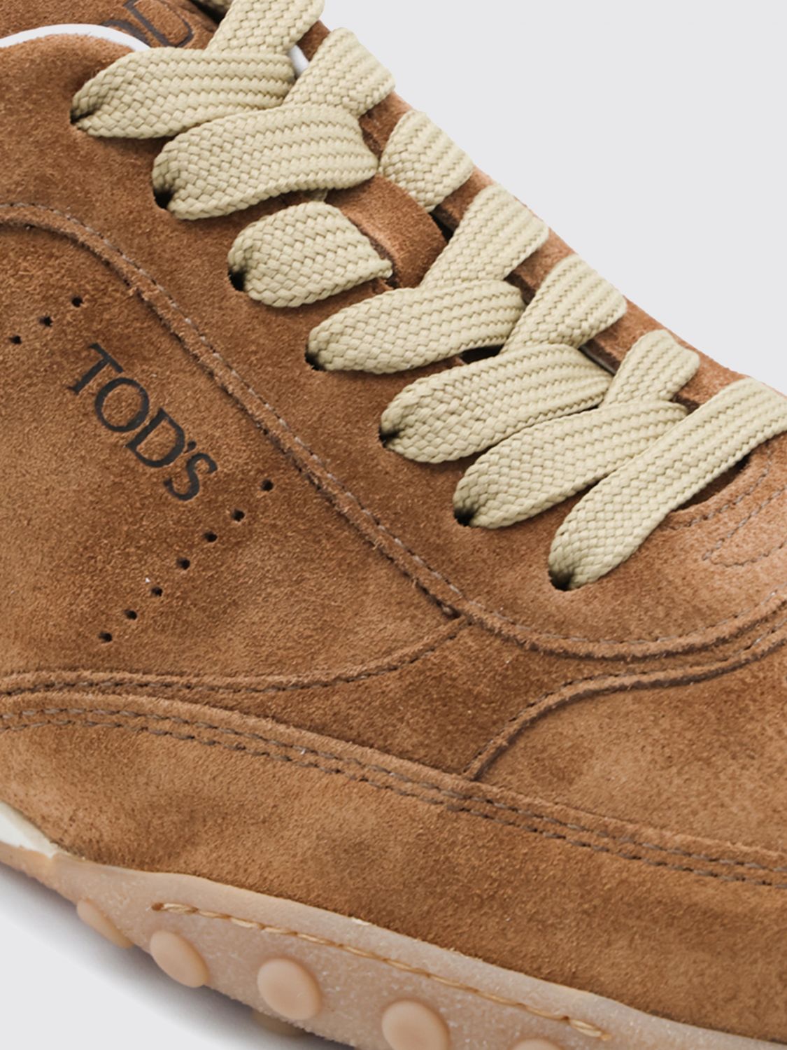 suede low-top sneakers with gommini and embossed logo