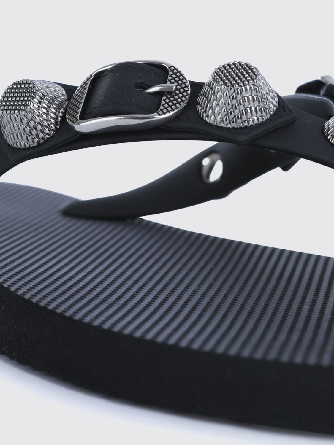 studded rubber thong sandals with decorative buckle