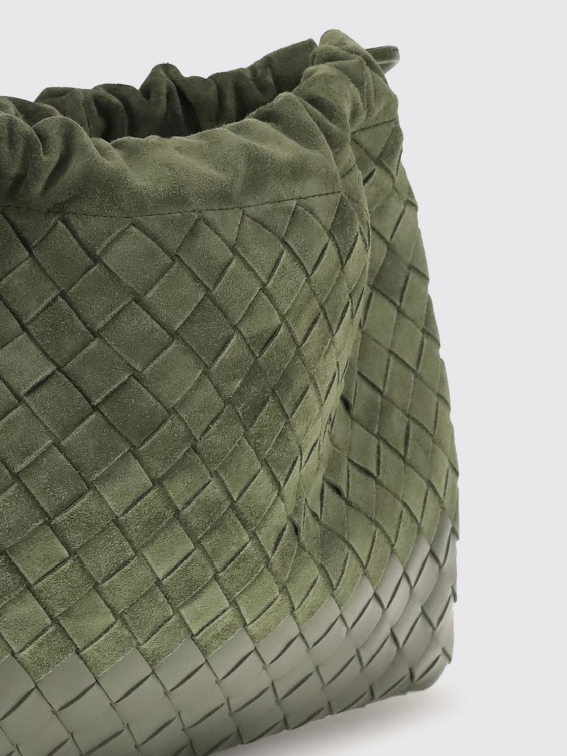 intrecciato woven calf leather bucket clutch with drawstring closure