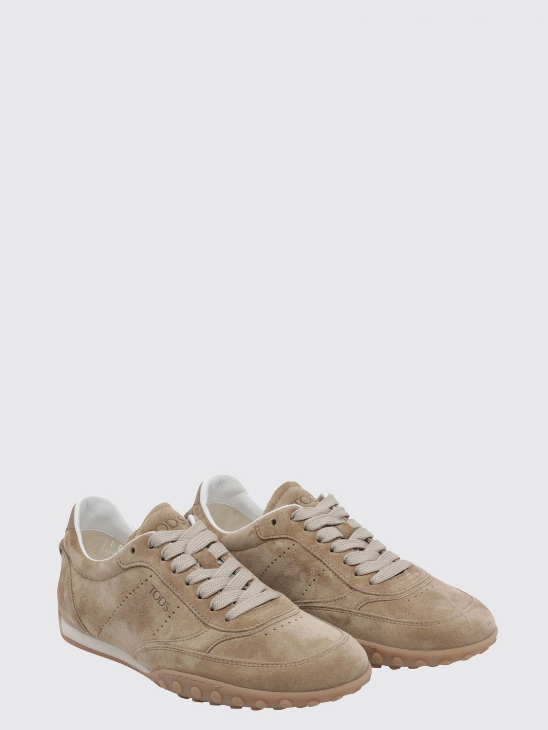 low-top suede sneakers with iconic rubber pebble sole