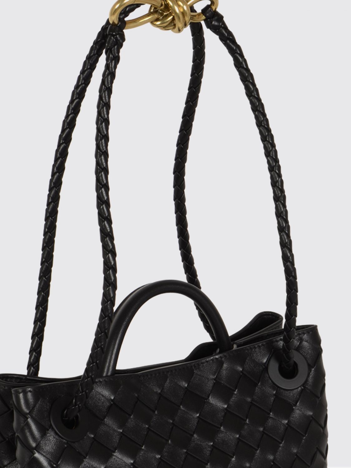 andiamo small handbag in woven leather with a shoulder strap
