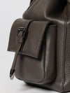 utility backpack in grained leather with snap closure