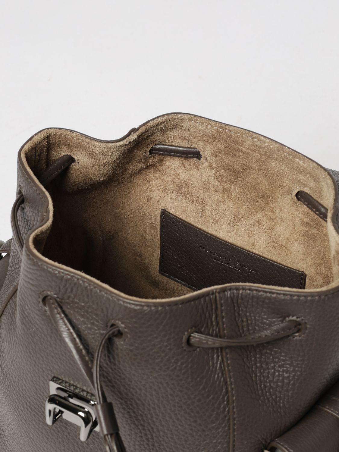 utility backpack in grained leather with snap closure
