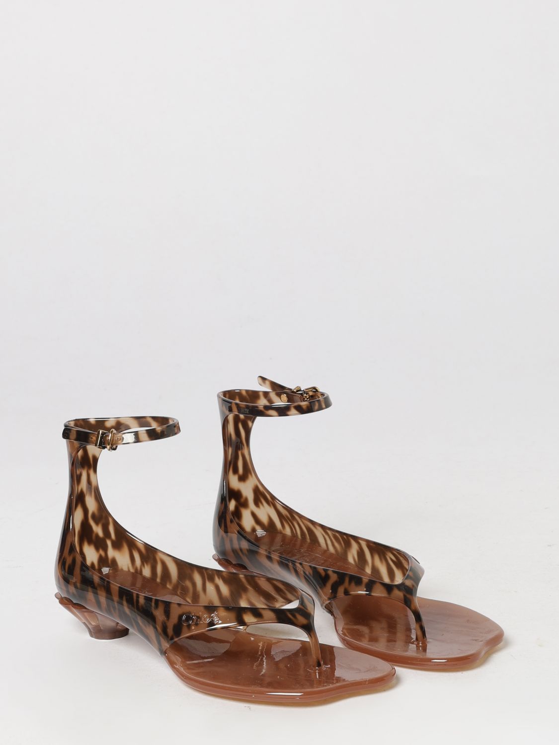 chloé jelly thong sandals in pvc with tortoiseshell pattern and strap