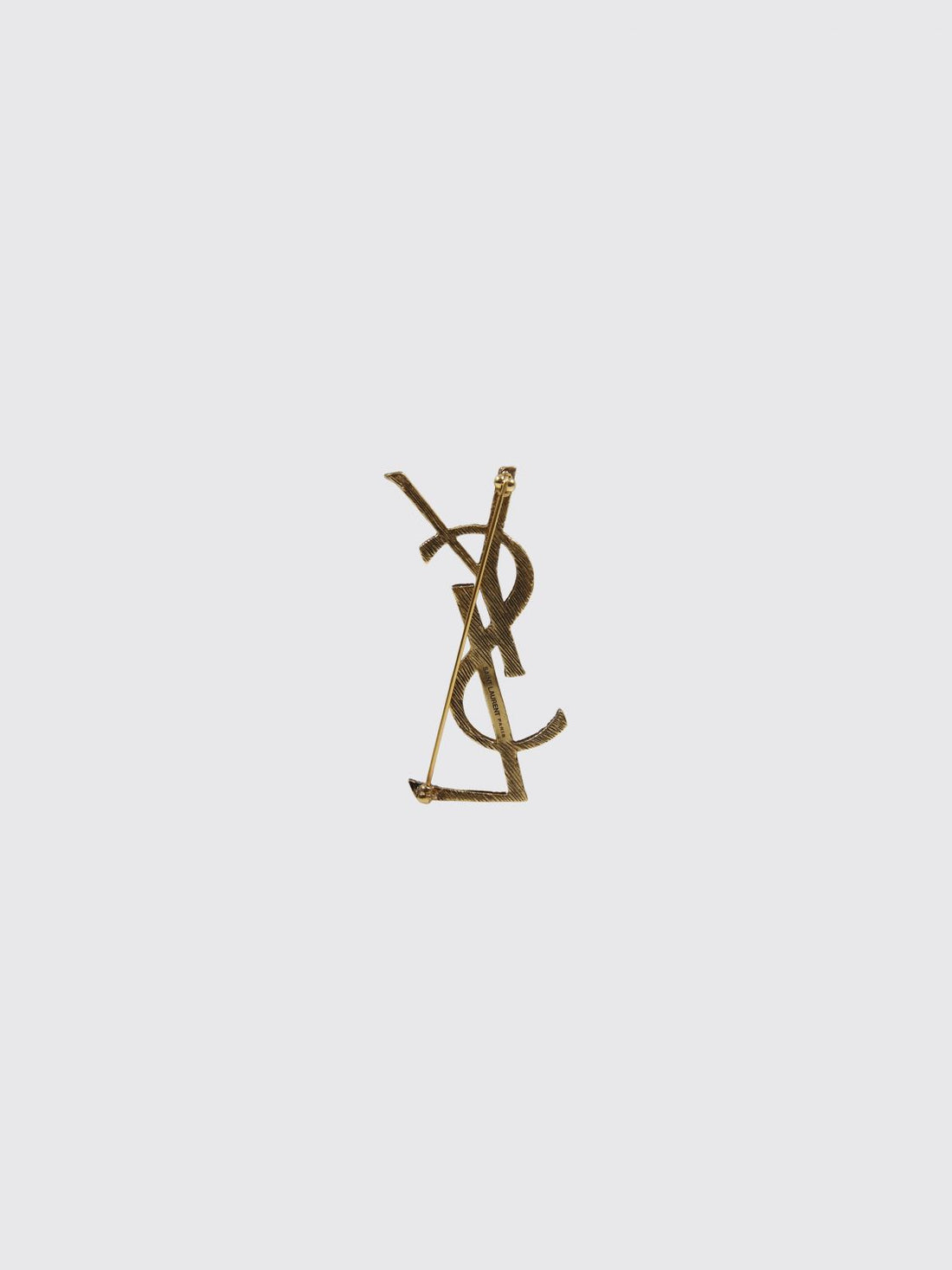 SAINT LAURENT OS ysl monogram brooch in brushed brass with a gold-finish