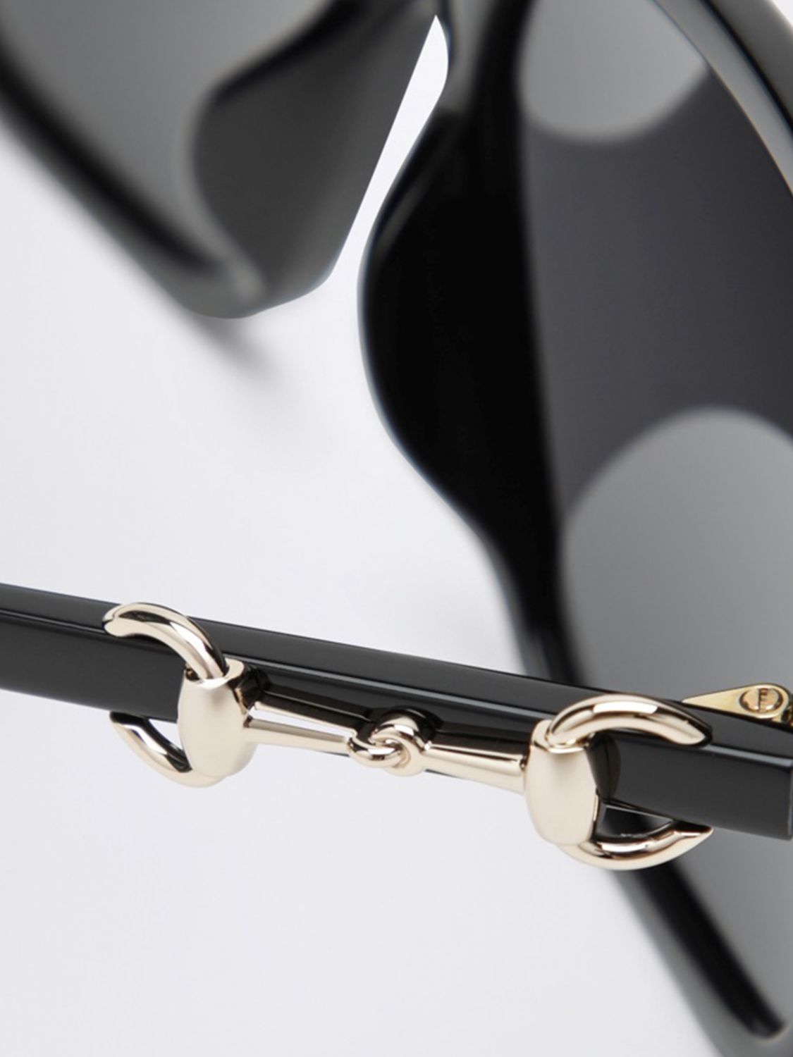 classic cat-eye sunglasses in black acetate with horsebit detail